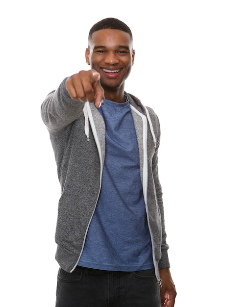 Smiling african american man pointing finger  