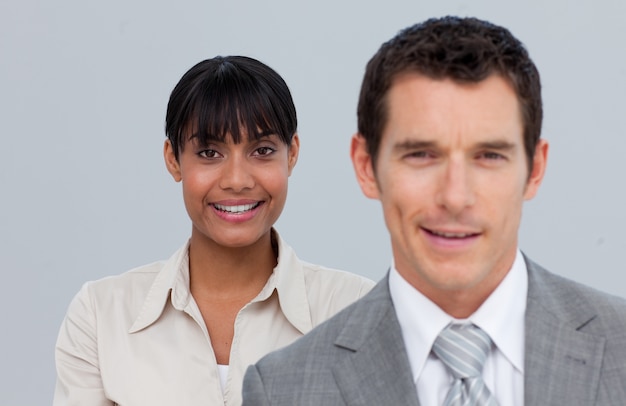 Smiling Afro-American businesswoman with her colleague