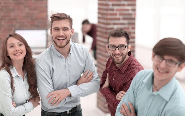 Smiling american team discussing business project during coffee