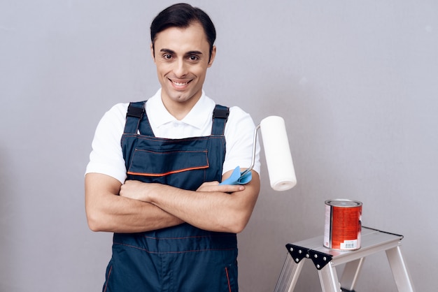 Smiling Arab Master with Paint and Brush in Hand.