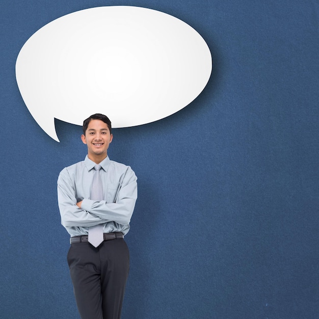 Smiling asian businessman against speech bubble