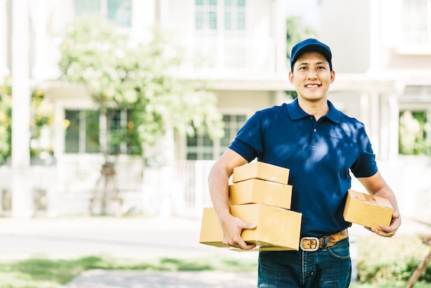 Smiling Asian delivery man