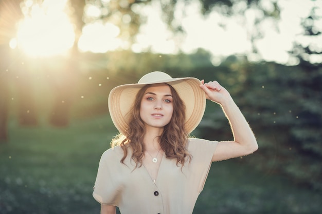 Smiling attractive woman in summer dress