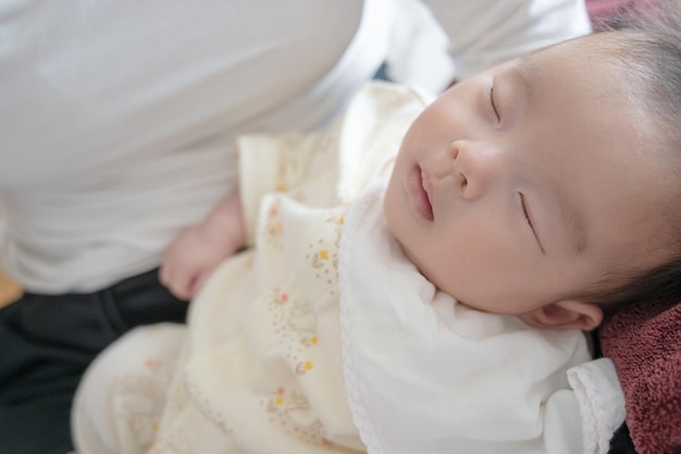 smiling baby sleeping