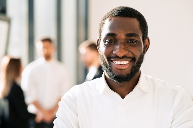 Smiling black man in office