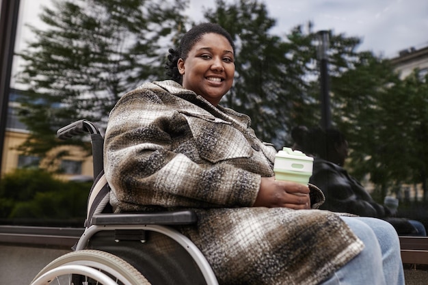 Smiling Black Woman with Disability Outdoors