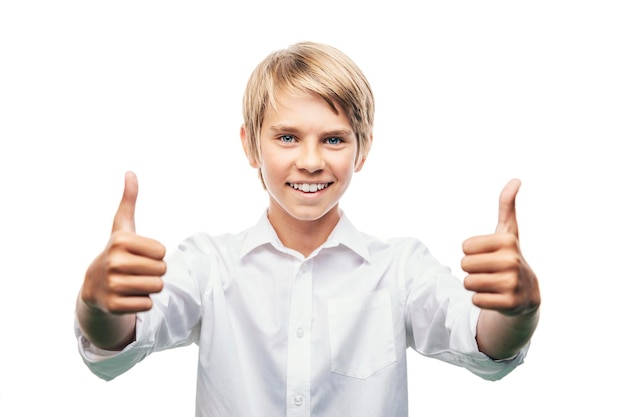 Smiling blond boy showing thumbs up