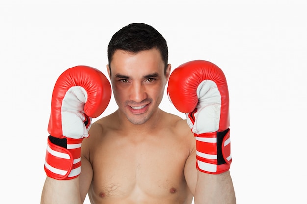 Smiling boxer taking cover