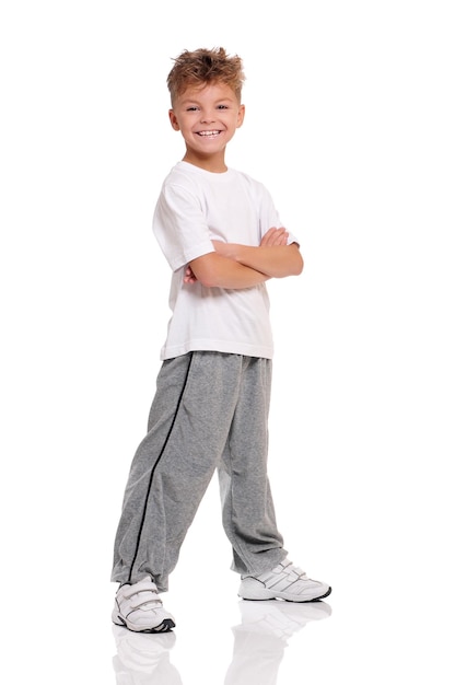 Premium Photo | Smiling boy with hands folded isolated on white background