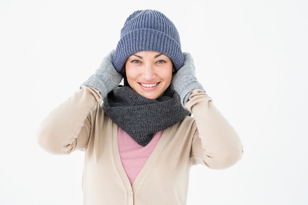 Smiling brunette wearing warm clothes