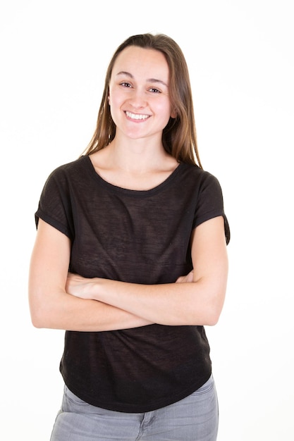 Smiling brunette woman in casual attire clothes posing with crossed arms