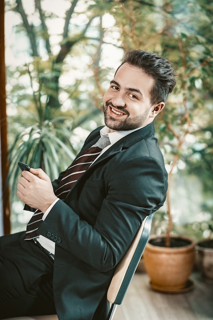 Smiling business man in suit