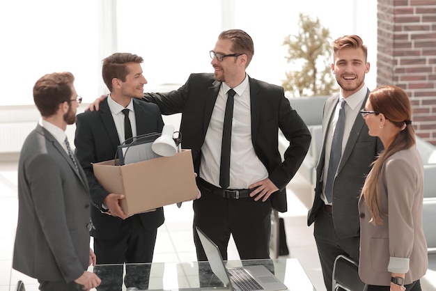 Smiling business team meets new employee