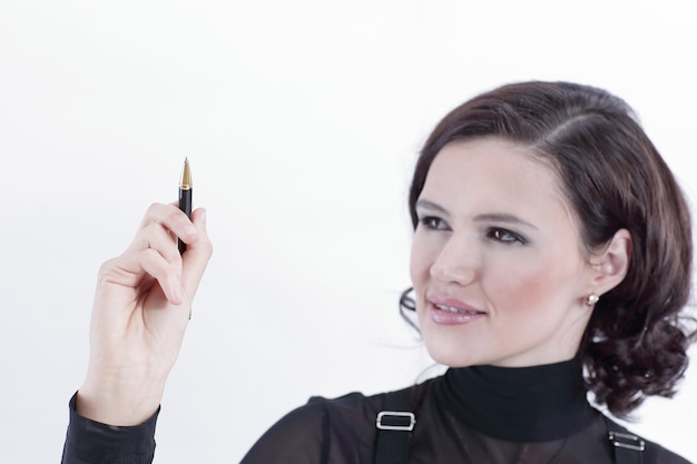 Smiling business woman pointing with pen dot on a blank screen