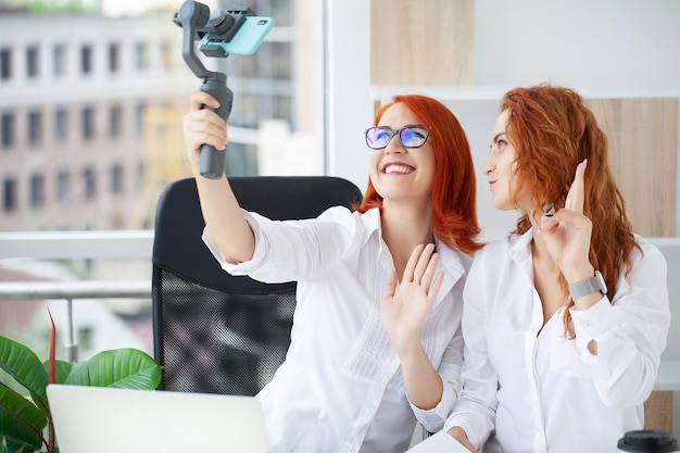 Smiling business woman working together on contract documents