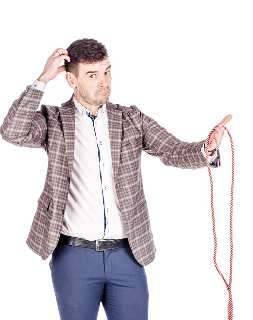 Smiling businessman holding rope for magic trick isolated against white background business people and magic concept