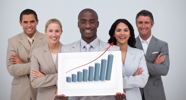 Smiling businessman holding a white card with graph