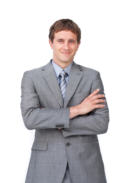 Smiling businessman with folded arms 