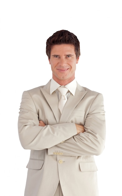 Smiling businessman with folded arms