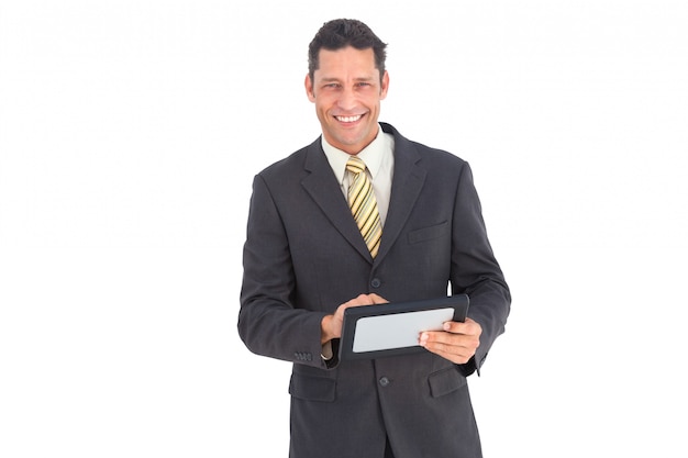 Smiling businessman with pc tablet