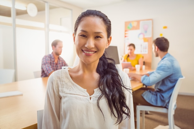 Smiling businesswoman looking at the camera