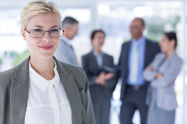 Smiling businesswoman looking at the camera  