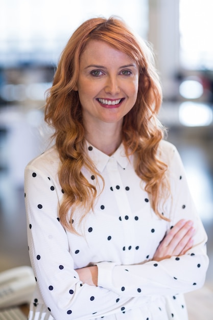 Smiling businesswoman in office