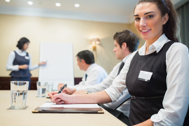 Smiling businesswoman during a presentation