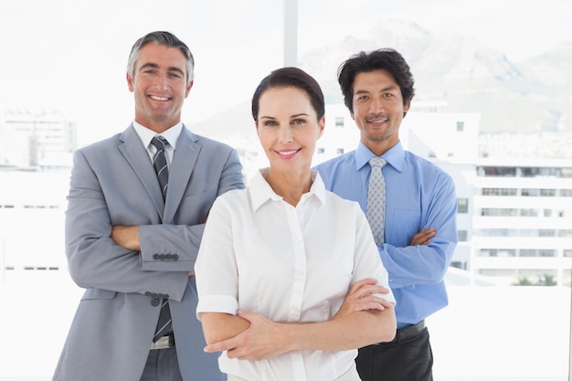 Smiling businesswoman with work colleagues