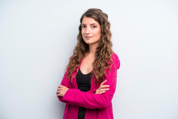 smiling to camera with crossed arms and a happy confident satisfied expression lateral view