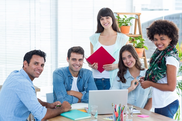 Smiling casual colleagues in a meeting