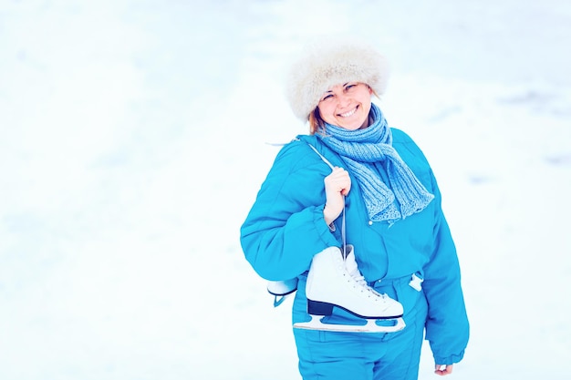 Smiling cheerful girl wearing warm clothing on white