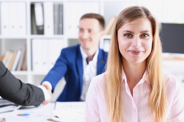 smiling cheerful girl at workplace