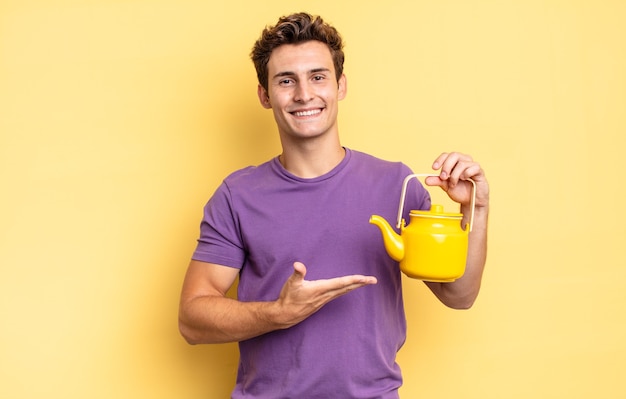 Smiling cheerfully, feeling happy and showing a concept in copy space with palm of hand. teapot concept