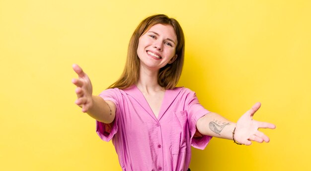 Smiling cheerfully giving a warm friendly loving welcome hug feeling happy and adorable