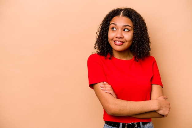 Smiling confident with crossed arms