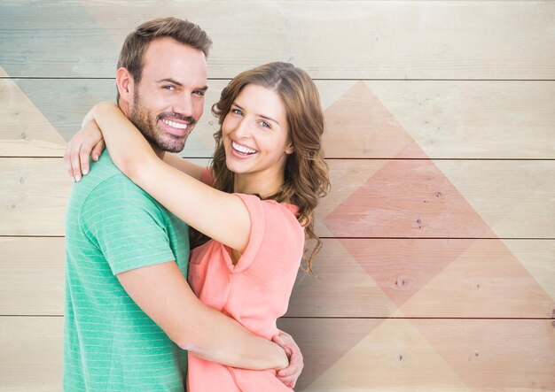 Smiling couple embracing each other