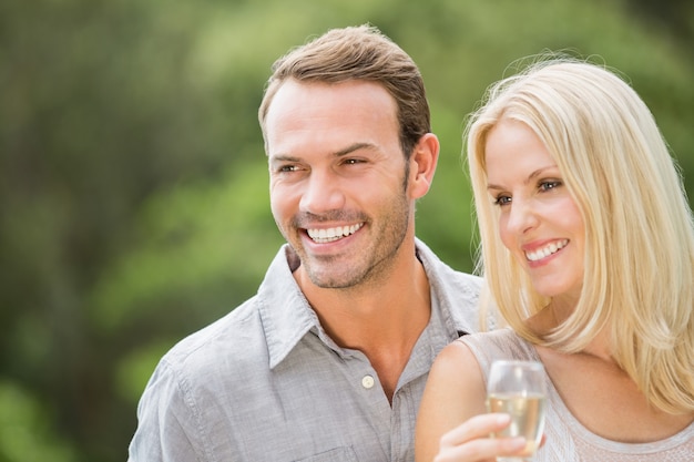 Smiling couple looking away 