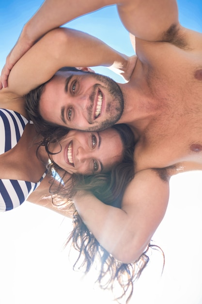 Smiling couple looking at camera