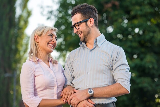 Smiling couple looking at each other