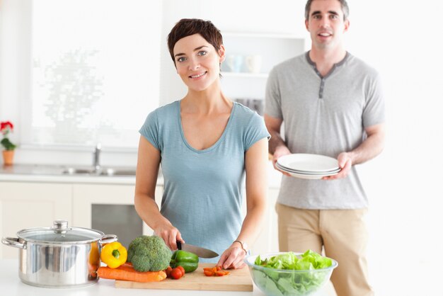 Smiling Couple preparing lunch