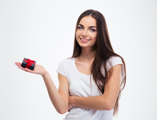 Smiling cute woman holding jewerly gift box