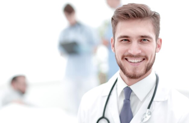 Smiling doctor on blurred background