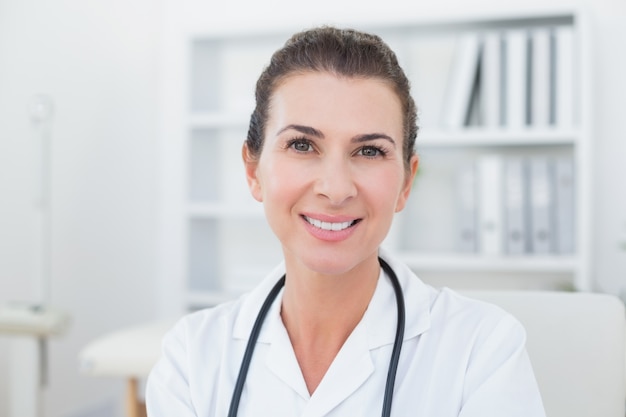 Smiling doctor looking at camera 