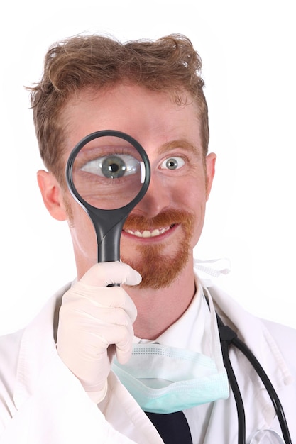 Smiling doctor with loupe