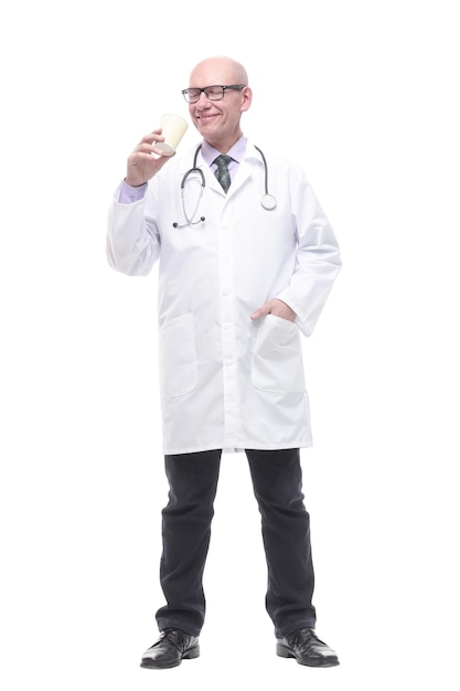 Smiling doctor with a takeaway coffee isolated on a white