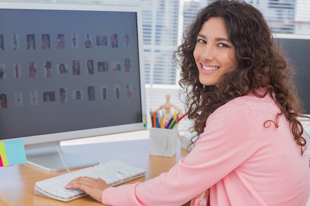 Smiling editor at her desk