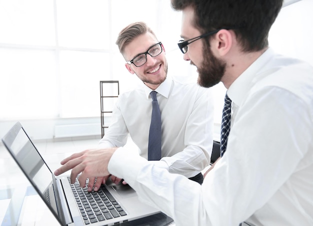 Smiling employees at the Desk in the office