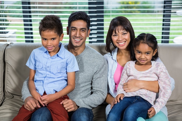 Photo smiling family on the sofa