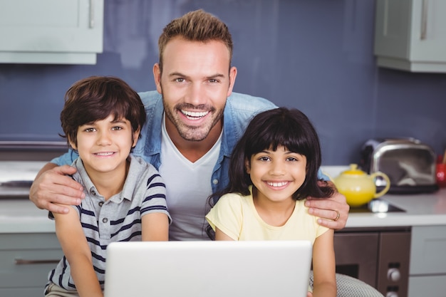 smiling father with his children 